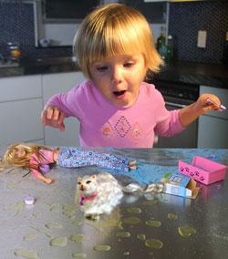 Barbie and her peeing cat will make a great impression at the dinner table. RAUL RUBIERA/Herald Staff