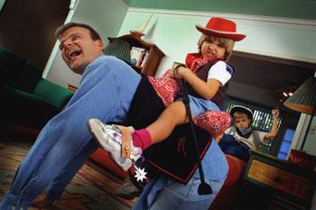 Giddy-up! Every dad needs a Daddle, so his kids can abuse him. RAUL RUBIERA/Herald Staff