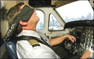 ZZZZZZZZZZZZZZZZZ: Hopefully, the pilot won't wear this Nap-Strap Airline Passenger Head-Restraint Device, which is useful for passengers who want to nap and don't care what they look like.